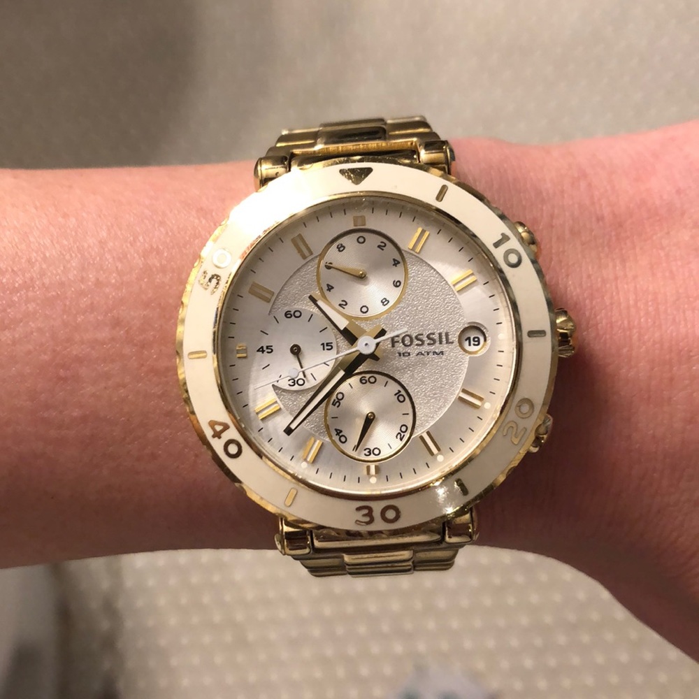 Women’s gold fossil watch